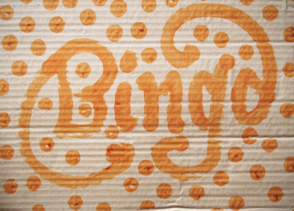 Bingo lettering in orange with dots surrounding it