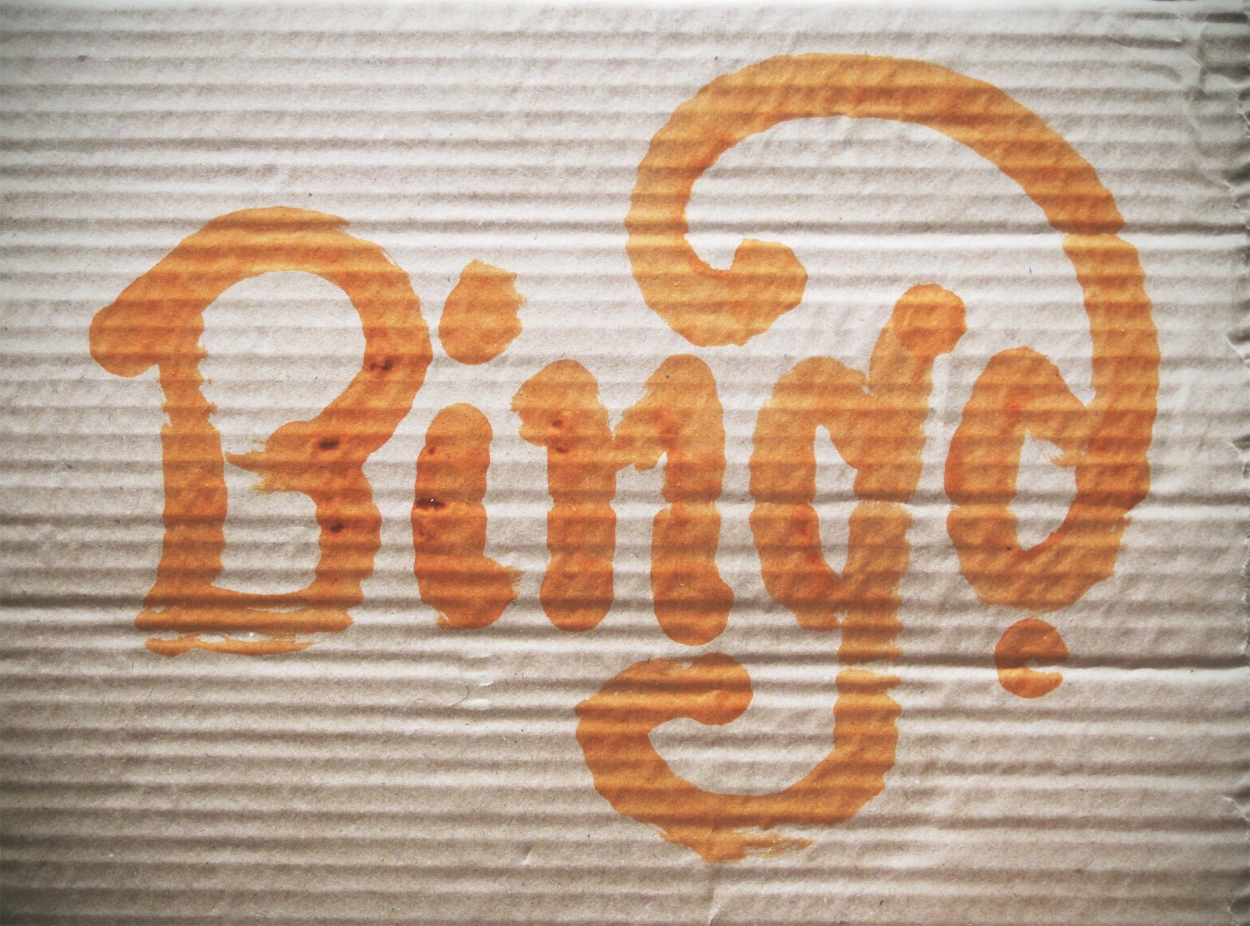 Bing as orange lettering on cardboard